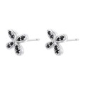 Close-up of silver flower stud earrings with black crystals and minimalist design - Platinum Black Zirconia