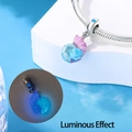 Detailed view of ocean conch charm with blue-purple gradient and luminous effect - Luminous Conch