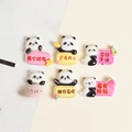 Detail view of 6 DIY resin panda charms with cute fruit slogans for shoe decoration - Panda Word Plate