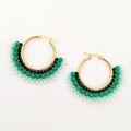 Detailed close-up of fan-shaped beaded hoop earrings with black and green bead tassels - Green