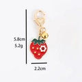 Zinc alloy strawberry keychain with red enamel finish and heart-shaped lobster clasp - Strawberry Bell
