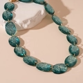 Detailed close-up of teal resin oval chain link necklace with unique ice crackle texture - Teal Green Oval Necklace