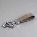 Grey suede leather car keychain with silver metal rings and precise stitching detail - Grey/Silver