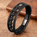 Close-up of black braided leather multi-layer bracelet with volcanic stone beads - Black Leather + Black Lava Stone