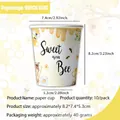 Detail view of bee-themed 9oz disposable paper cups showing size and sweet honeycomb design - Paper Cups 10Pcs