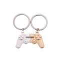 Silver and gold gaming controller couple keychains forming a heart shape on white background - Gold and Silver Handle