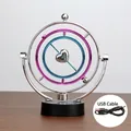 Perpetual motion desk toy with silver heart and concentric rings on a black base with USB cable - 605 Cord And Battery Dual-use Model ♢ / Original Packaging ♢