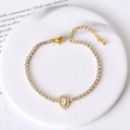 Gold tennis bracelet with sparkling round zircons and a pear-shaped drop pendant - White Zircon Teardrop