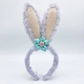 Detail of plush purple rabbit ear headband with green satin flower and pink button accent - Purple with 5 Flowers