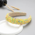 Detail of yellow wide headband with colorful glitter candy sprinkles on a white tray - Yellow Mixed