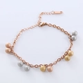 Elegante pulsera con cuentas de acero mate tricolores y cadena de oro rosa - Oro rosa