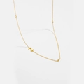 Detail of gold necklace with a minimalist letter Z pendant and three clear cubic zirconia stones - Letter Z / 925 Sterling Silver Plated With 18k Gold