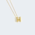 Elegant gold choker necklace featuring a pearl-inlaid H letter pendant for women - Letter H