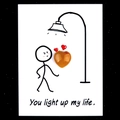 Healing heart-shaped amber gemstone on a creative 'You light up my life' card - Yellow Jade