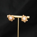 Elegant gold wire-wrapped pink pearl stud earrings displayed on a metal stand - Champagne Purple Starry Sky Wire Studs