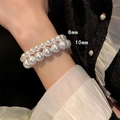 Detailed comparison of 8mm and 10mm French vintage pearl elastic bracelets on wrist - 8mm+10mm Pearl Bracelet Set