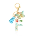 Resin initial F keychain with green dried flowers, mint stones, blue tassel and butterfly - Letter F