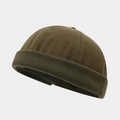 Detail view of olive green docker hat showing canvas texture and ribbed knit brim - Army Green