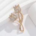 Elegant gold tulip brooch with sparkling rhinestones on minimalist white display - Double Tulip Gold