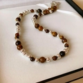 Faux tiger eye beaded necklace with alternating silver metal spheres and brown beads - Tiger Eye Silver Bead Alternate Necklace