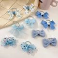 Set of nine blue cartoon hair ties for girls including bow and mesh designs - Dreamy Blue 10Pcs Set