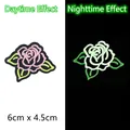 Glow-in-the-dark pink rose embroidery patch 6x4.5cm showing day and night effect - Rose/GZ-05548-2