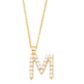 Detail shot of the golden letter M necklace pendant featuring small white pearls inlay - Letter M