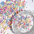 Bunte Macaron-Farben Herz Nagelkunst Charms aus Harz 4x5mm Set auf einem Glasteller - Mehrfarbig