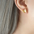 Frosted butterfly stud earrings in rose gold finish shown on model's earlobe - Butterfly Stud Earrings / Gold