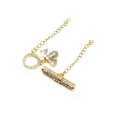 Macro detail of gold plated brass OT toggle clasp with butterfly charm and cubic zirconia - Butterfly Design