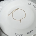 Adjustable 18K gold plated bracelet featuring a dainty Zirconia letter P pendant - Letter P