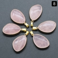 Set of six pink rose quartz teardrop pendants with golden metal edges on dark background - Rose Quartz (Single)