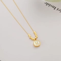 Elegant gold titanium steel necklace featuring a white shell H-letter pendant and beads - H-Letter Shell Square
