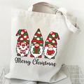 Detail showing Christmas gnomes print and Merry Christmas text on white canvas tote bag - Merry Christmas Gnome (07) / White