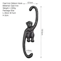 Rustic cast iron monkey wall hook in antique bronze finish for garden and home decor - Cast Iron Gibbon Hook