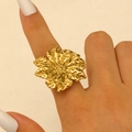 Exaggerated golden flower ring with hammered texture and polished finish on finger - Gold (0818)