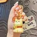 Cute yellow striped resin cat keychain with a red collar, golden bell, and orange ring - Wood Carving Style Cat - Orange Striped