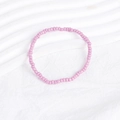 Detailed macro view of soft lavender beaded bracelet with high-gloss glazed finish beads - Lavender