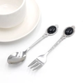 Polished stainless steel spoon and fork set with black oval gemstone handle accents - Spoon / Black Agate