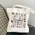 White canvas tote bag featuring colorful science theme illustrations and math symbols - C10 Science Encyclopedia No Inner Pocket No Zipper