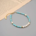 Baroque pearl and turquoise beaded bracelet with gold accents and adjustable chain - Bracelet
