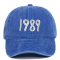 Detail of vintage washed cotton baseball cap with 1989 white 3D embroidery on front - Sapphire Blue