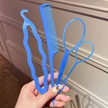 Blue plastic hair styling tool set with tail comb and hair loops held in hand - Style 6 Bun Maker Kit (D4-052) / Four-Piece Set / Blue