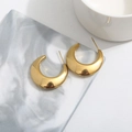 Elegant 18k gold plated chunky U-shape teardrop hoop earrings on a marble tray - Moon