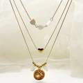Drielagige gouden kettingset met ster-, maan- en hartvormige hangers en wit emaille - Bruin