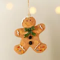 Gingerbread man resin hanging ornament with green bow and colorful dots for Christmas tree - Green Bow Gingerbread Man