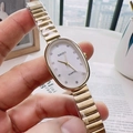 Women's gold steel watch with oval shell dial and diamond accents in close-up shot - Gold Steel Strap White Dial
