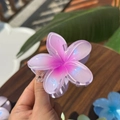 Macro shot of purple gradient frangipani hair claw with pearlescent finish - Plumeria Jelly Texture / Blue and Purple