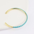 Detailed view of gold C-shape cuff bracelet with light blue enamel stripes - Sky Blue