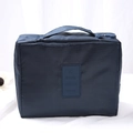 Navy blue large travel toiletry bag with textured waterproof fabric and top handle - Navy Blue